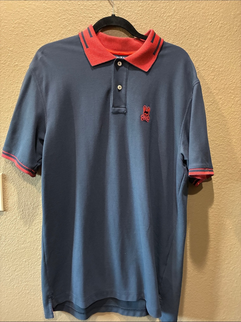 Men's Psycho Bunny Blue Polo Shirt with orange Trim